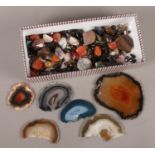 A box of assorted gem stones, agate slices etc.