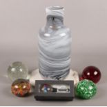 A collection of mainly glassware. Includes paperweights, octagonal marble base, Iina Vuorivirta vase
