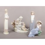 Four NAO by Lladro figurines. Boy with dog, Woman & bird, Girl & duck etc