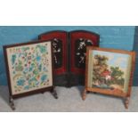 Three fire screens. Including oak framed tapestry example cottage scene, folding example, etc.