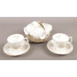 Six Royal Albert Haworth pattern bone china cups and saucers.