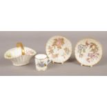 Four pieces of Royal Worcester ceramics. To include two miniature dishes, dating from 1890. Handle