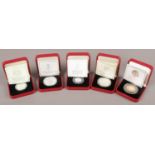 A selection of five boxed Pobjoy mint coins. To include a Gibraltar coin depicting Peter Rabbit 1/