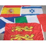 A quantity of flags. Including Spain, Israel, Italy, Scotland, etc.