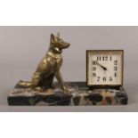 An Art deco bronze and marble marble clock set, signed Tedd.