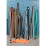 An assortment of thirteen fishing rods. To include a Shakespeare Sigma 1405 1.80m, a ER Craddock