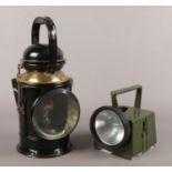A vintage Great Western Railway lamp along with a military chloride lamp.