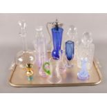A tray of glassware. Including cut glass decanters, art glass, coloured examples, etc.