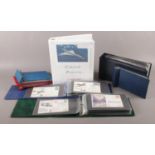 A selection of postcards and stamps. To include an album of seventy four Concorde postcards, an