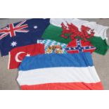 A quantity of flags. Including Australia, Netherlands, Wales, etc.