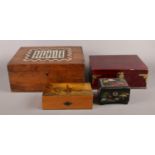 Four assorted storage boxes. To include oriental musical jewellery box and large trinket box with