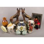 A quantity of mostly ceramics. Including pair of plaster mantel dogs, tiffany style lamp shade,