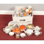 A box of Oriental ceramic part tea sets. To include cups and saucers, tea pots and cream jugs.