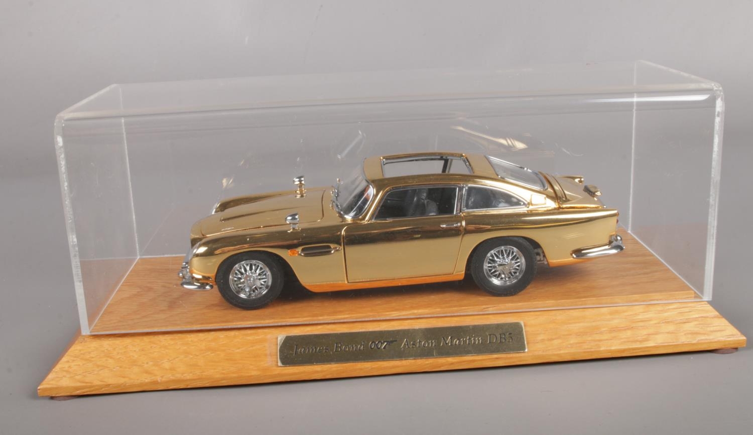 A Danbury Mint 1:24th Scale Gold Plated Finish James Bond Aston Martin DB5. In display case, box & - Image 2 of 2