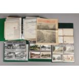 A substantial collection of photograph albums, postcards and newspaper articles focusing on
