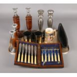 A quantity of miscellaneous. Including wooden and silver plate candlesticks, cased set of knives,