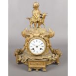 A French gilt metal mantel clock. Decorated with young child & goat. (35cm) Appears to be running.