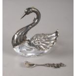 A crystal and sterling silver swan salt cellar and spoon. Has a London import mark for 1986. H: 7.