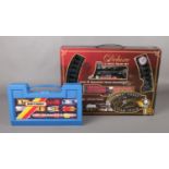 A Matchbox carry case containing 18 cars, together with 15 piece deluxe train set.