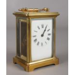 A brass and glass presentation carriage clock. Presented to The Larkhill Mother's Union. Appears