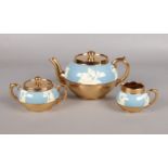 A collection of Gibson's Jasperware. Teapot, milk jug, sugar bowl.