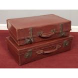 Two vintage suitcases. Includes Revelation example.