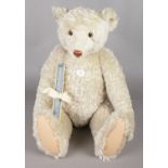 A Steiff limited edition 1994 Replica Teddy Bear 1908 white, 2033 of 7000 worldwide. Gold button