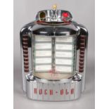 A 1950's Hi-Fidelity Rock-Ola 120 chrome wall mounted jukebox. Not in working order.