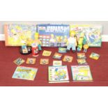 A large collection of Simpsons memorabilia. To include board games, Homer doll and Bart money box