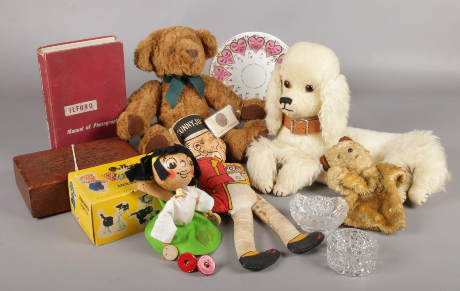 A collection of miscellaneous. Boxed Pelham Puppet girl, Poodle Nightdress case, Derby plate, Ilford