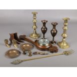 A collection of mainly metalwares. Includes oak barometer, brass candlesticks, vases etc.