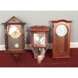 A quantity of wall clocks. (3) Acctim, C. Woods & Sons etc