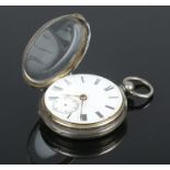 A silver pocket watch, with engine turned back. Assayed for Chester, 1873, by Samuel Jackson.