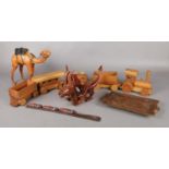 A collection of wood and treen; to include a 5 piece train, a carved oriental articulating dragon