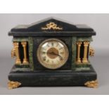 An ebonised and marble effect 8 day mantel clock by Sessions Clock Co.