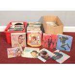 Three boxes of 45 rpm vinyl records. Bros, Bucks fizz, Frank Sinatra, Kim Wilde, Rod Stewart, Nat