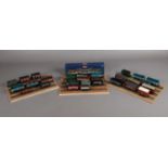 A collection of assorted 00 gauge wagons and rolling stock. To include Hornby & a boxed Bachmann set