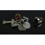 A Silver ring along with a key ring of assorted items. To include two silver coins ( 3 pence from