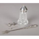 A collection of silver/silver mounted items. Includes two thimbles, mustard spoon, fork and glass