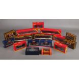 Sixteen boxed 00 gauge scale models from various makers. To include Hornby, Bachmann and Mainline