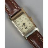 A gents Limit 9ct gold wristwatch on leather strap. Running.