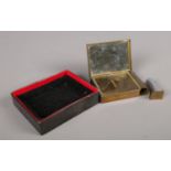 A vintage Charmant deluxe musical powder compact and lipstick case in original box. H:6cm, W: 8cm.