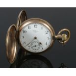 A Gold Plated full hunter pocket watch, with movement by Waltham of U.S.A (Traveller) and the casing