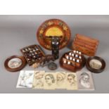 A quantity of collectables, mainly wooden items. Includes tribal bust, thimbles, pot lids etc.