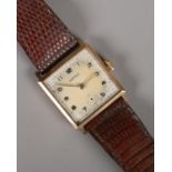 A gents 9ct gold Vertex manual wristwatch. Seconds finger missing. Lacking glass. Does appear to