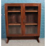 A Victorian glazed mahogany bookcase top.