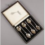 A cased set of six silver teaspoons with twisted stem. Assayed Birmingham 1930 by A J Bailey.