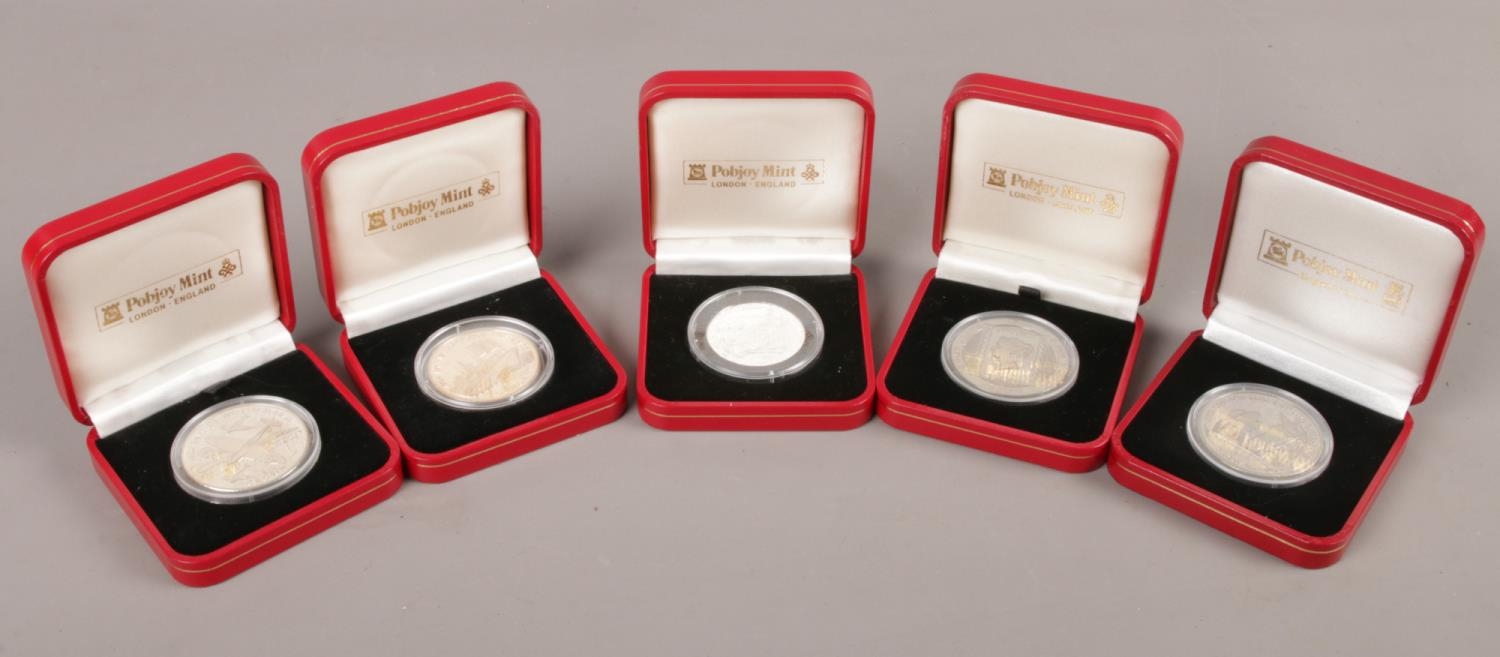 Five boxed Pobjoy mint coins from Gibraltar and Isle of Man. To include a Penny Black Anniversary