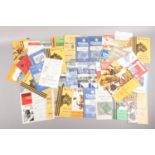 Approximately 55 football programmes from 1950s/1960s, focusing on Hull City, Chelsea and Manchester