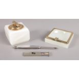 Four white onyx smoking related items. To include Calibri alabaster desk lighter, ashtray and pipe